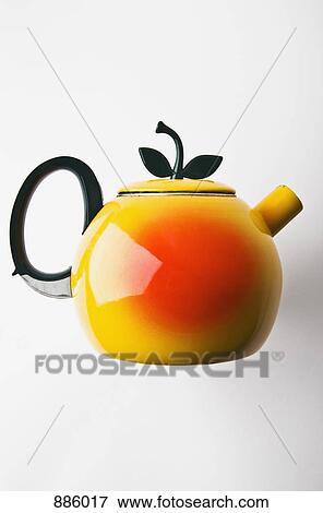 Stock Photo - A teapot in the form of a pear. Fotosearch