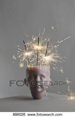 Lit sparklers in a porcelain head View Large Photo Image Stock Photograph - Lit sparklers in a porcelain head. Fotosearch
