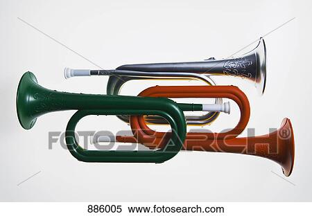 Stock Photography - Three miniature toy horns. Fotosearch
