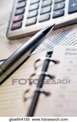 Appointment book, calculator and pen, close-up View Large Photo Image Stock Photography - Appointment book, calculator and pen, close-up. Fotosearch