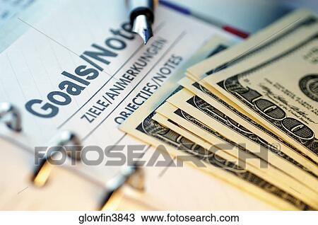 Appointment book, pen and US one hundred dollar bills, close-up View Large Photo Image Stock Image - Appointment book, pen and US one hundred dollar bills, close-up. Fotosearch