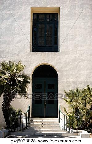 Arched doorway in a stucco building, San Diego, California, USA View Large Photo Image Stock Photo - Arched doorway in a stucco building, San Diego, California, USA. Fotosearch