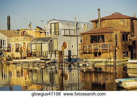 Buildings on the waterfront View Large Photo Image Stock Photograph - Buildings on the waterfront. Fotosearch