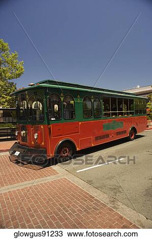 Bus parked on a roadside View Large Photo Image Stock Image - Bus parked on a roadside. Fotosearch