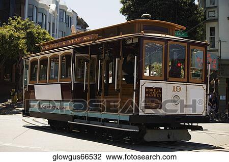 Cable car moving on a railroad track View Large Photo Image Stock Image - Cable car moving on a railroad track. Fotosearch