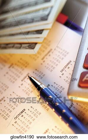Calculator, calendar, pen and US one hundred dollar bills, close-up View Large Photo Image Stock Image - Calculator, calendar, pen and US one hundred dollar bills, close-up. Fotosearch