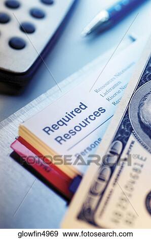 Calculator, instructions, pen and United States one hundred dollar bill, close-up View Large Photo Image Stock Photo - Calculator, instructions, pen and United States one hundred dollar bill, close-up. Fotosearch