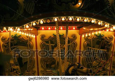 Carousel in an amusement park at night, San Diego, California, USA View Large Photo Image Stock Image - Carousel in an amusement park at night, San Diego, California, USA. Fotosearch