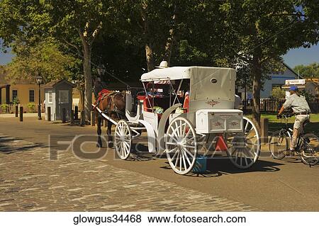 Carriage parked on the street View Large Photo Image Stock Photo - Carriage parked on the street. Fotosearch