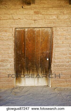 Close-up of a closed door of a house View Large Photo Image Stock Photo - Close-up of a closed door of a house. Fotosearch