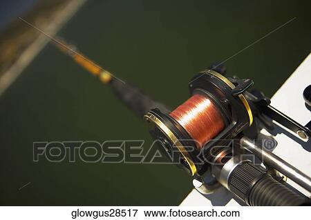 Close-up of a fishing pole View Large Photo Image Stock Photo - Close-up of a fishing pole. Fotosearch
