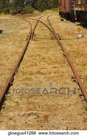 Close-up of a railroad track View Large Photo Image Stock Photo - Close-up of a railroad track. Fotosearch