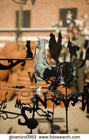 Close-up of a rooster weather vane View Large Photo Image Stock Image - Close-up of a rooster weather vane. Fotosearch