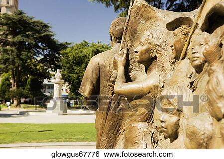 Close-up of a statue in a garden View Large Photo Image Stock Photograph - Close-up of a statue in a garden. Fotosearch