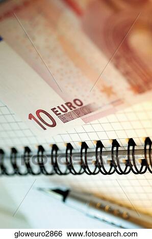 Close-up of a ten Euro banknote on a notebook View Large Photo Image Stock Photograph - Close-up of a ten Euro banknote on a notebook. Fotosearch