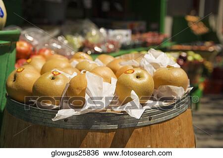 Close-up of apples in a store View Large Photo Image Stock Photograph - Close-up of apples in a store. Fotosearch