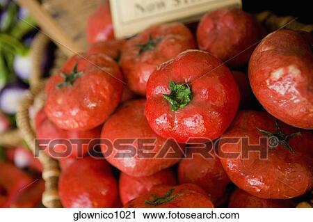 Close-up of artificial tomatoes in a basket View Large Photo Image Stock Image - Close-up of artificial tomatoes in a basket. Fotosearch