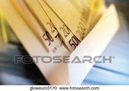 Close-up of assorted Euro banknotes in an envelope View Large Photo Image Stock Image - Close-up of assorted Euro banknotes in an envelope. Fotosearch
