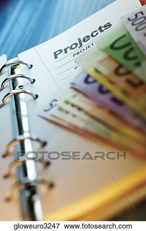 Close-up of assorted Euro banknotes on a diary View Large Photo Image Stock Photo - Close-up of assorted Euro banknotes on a diary. Fotosearch
