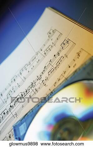 Close-up of CD and sheet music View Large Photo Image Stock Photo - Close-up of CD and sheet music. Fotosearch