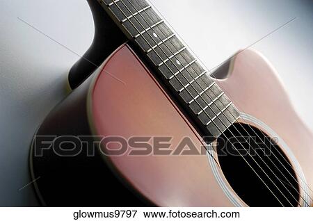Stock Photo - Close-up of electric guitar, its strings and frets. Fotosearch