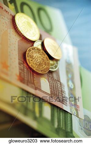 Close-up of Eurocent coins on assorted Euro banknotes View Large Photo Image Stock Image - Close-up of Eurocent coins on assorted Euro banknotes. Fotosearch