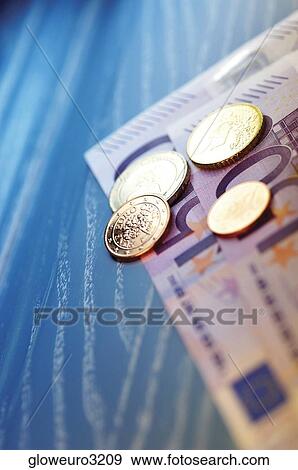 Close-up of Eurocent coins on Euro banknotes View Large Photo Image Stock Photo - Close-up of Eurocent coins on Euro banknotes. Fotosearch