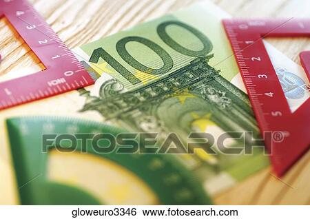 Close-up of geometric instruments on a one hundred Euro banknote View Large Photo Image Stock Photograph - Close-up of geometric instruments on a one hundred Euro banknote. Fotosearch