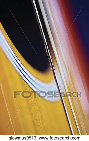 Close-up of guitar and its strings View Large Photo Image Stock Image - Close-up of guitar and its strings. Fotosearch