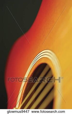 Close-up of guitar and its strings View Large Photo Image Stock Photo - Close-up of guitar and its strings. Fotosearch