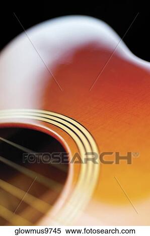 Close-up of guitar and its strings View Large Photo Image Stock Photography - Close-up of guitar and its strings. Fotosearch