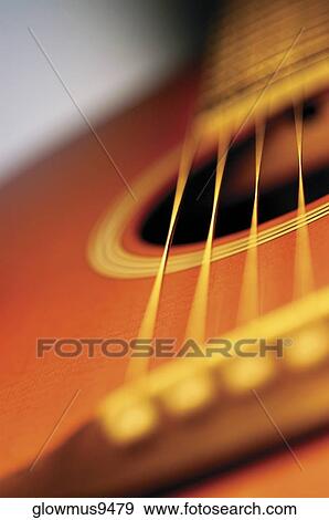 Close-up of guitar bridge and strings View Large Photo Image Stock Photo - Close-up of guitar bridge and strings. Fotosearch