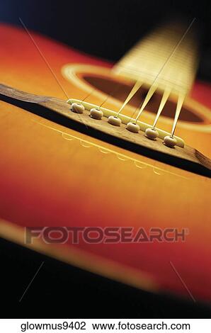 Close-up of guitar, including bridge and strings View Large Photo Image Stock Image - Close-up of guitar, including bridge and strings. Fotosearch