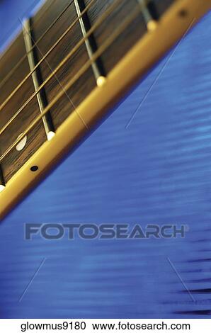 Close-up of handle and strings of electric guitar View Large Photo Image Stock Image - Close-up of handle and strings of electric guitar. Fotosearch