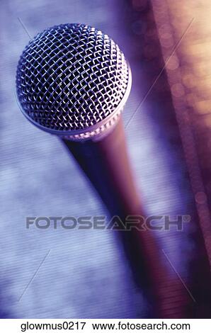 Stock Photo - Close-up of microphone. Fotosearch
