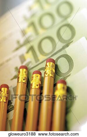Close-up of pencils on hundred Euro banknotes View Large Photo Image Stock Photo - Close-up of pencils on hundred Euro banknotes. Fotosearch