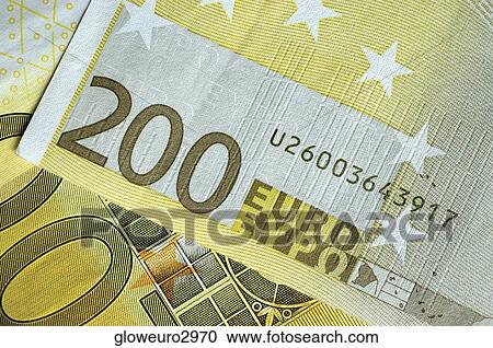 Stock Image - Close-up of two hundred Euro banknotes. Fotosearch