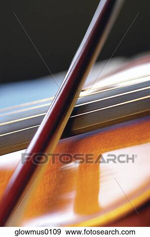 Close-up of violin and violin bow View Large Photo Image Stock Photo - Close-up of violin and violin bow. Fotosearch