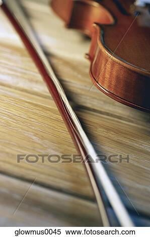 Close-up of violin and violin bow View Large Photo Image Stock Photography - Close-up of violin and violin bow. Fotosearch