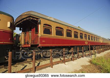 Commuter train on a railroad track View Large Photo Image Stock Photography - Commuter train on a railroad track. Fotosearch