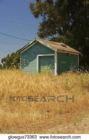 Cottage on a field View Large Photo Image Stock Image - Cottage on a field. Fotosearch