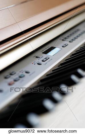 Stock Image - Electric piano keyboard, close-up. Fotosearch