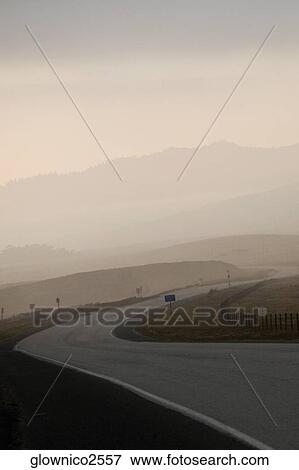 Empty stretch of road at dusk View Large Photo Image Stock Photo - Empty stretch of road at dusk. Fotosearch