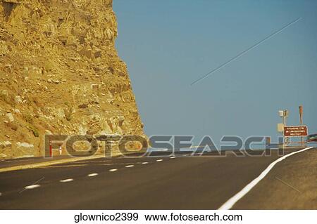 Stock Photo - Empty stretch of road. Fotosearch