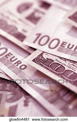 Euro 100 bank notes and United States one hundred dollar bills, close-up View Large Photo Image Stock Image - Euro 100 bank notes and United States one hundred dollar bills, close-up. Fotosearch