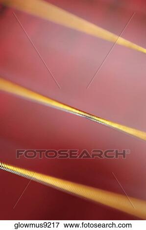 Extreme close-up of guitar strings View Large Photo Image Stock Photo - Extreme close-up of guitar strings. Fotosearch