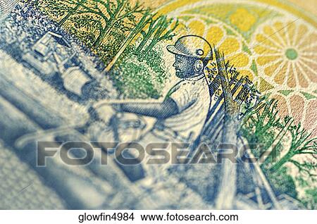 Picture - Extreme close-up of man on bank note. Fotosearch