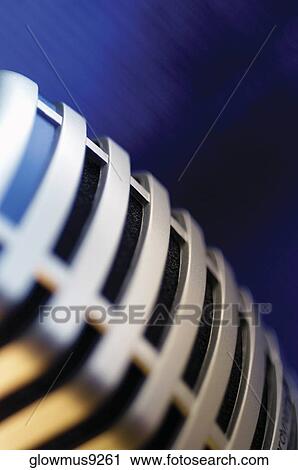 Stock Image - Extreme close-up of microphone. Fotosearch