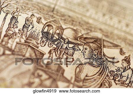 Stock Photo - Extreme close-up of people on bank note. Fotosearch
