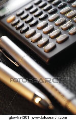 Extreme close-up of scientific calculator and pen View Large Photo Image Stock Image - Extreme close-up of scientific calculator and pen. Fotosearch